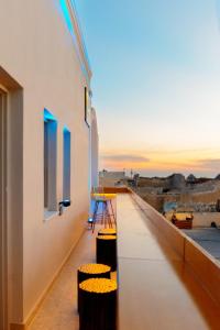 A balcony or terrace at Central Hostel Oia