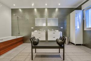 A bathroom at CORAL- Managed by Almarina Villas