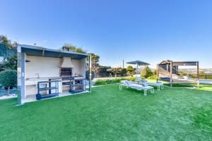 A garden outside CORAL- Managed by Almarina Villas
