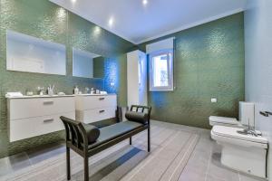 A bathroom at CORAL- Managed by Almarina Villas