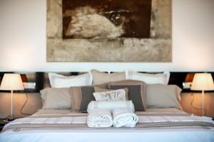 A bed or beds in a room at CORAL- Managed by Almarina Villas