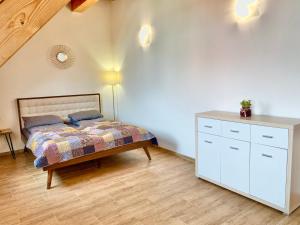 Posteľ alebo postele v izbe v ubytovaní Relax Apartment