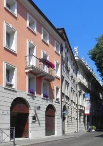 a building with a balcony on the side of it at Relais Santa Corona in Vicenza