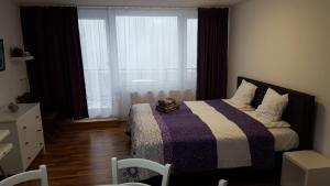 Postel nebo postele na pokoji v ubytování Appartement Grün-Weiß
