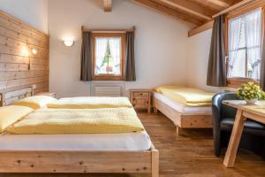 Postel nebo postele na pokoji v ubytování Hotel Landgasthof Staila