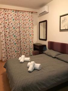 En eller flere senger på et rom på Apartment Boneta