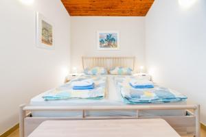 Posteľ alebo postele v izbe v ubytovaní Apartment Alan