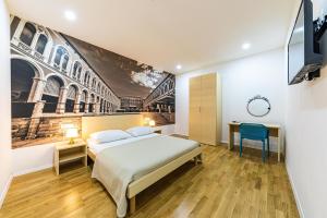 Split City Rooms客房内的一张或多张床位