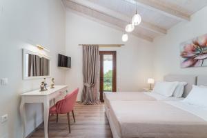 Posteľ alebo postele v izbe v ubytovaní Vincenzo Suites