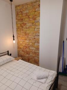 Postel nebo postele na pokoji v ubytování Lopica