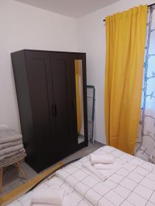 Postel nebo postele na pokoji v ubytování Lopica