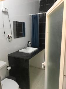 a bathroom with a sink and a toilet at La Bella BedoUina in Wadi Musa