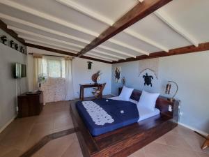 מיטה או מיטות בחדר ב-Villa Tonga Soa