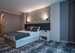 Postel nebo postele na pokoji v ubytování Yeşilyurt Park Otel