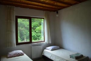 Postel nebo postele na pokoji v ubytování Trabzon green valley villa