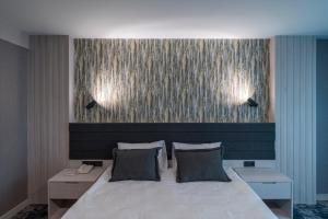 Postel nebo postele na pokoji v ubytování Yeşilyurt Park Otel + 29 fotografií