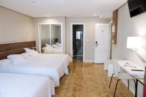 Posteľ alebo postele v izbe v ubytovaní Hotel Mogay