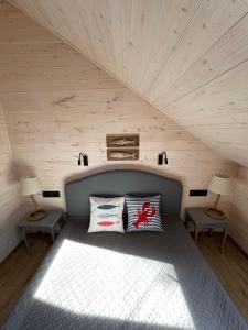Tempat tidur dalam kamar di Jodłowy Zakątek NEW