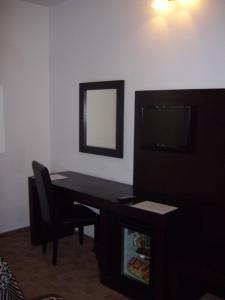 TV a/nebo společenská místnost v ubytování Hotel Sydney