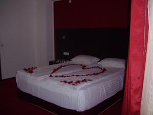 Postel nebo postele na pokoji v ubytování Hotel Sydney