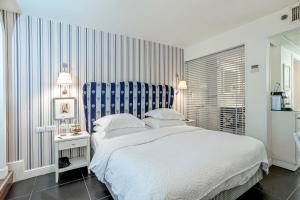 Postel nebo postele na pokoji v ubytování Shalom Hotel & Relax - an Atlas Boutique Hotel