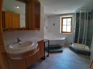 Kúpeľňa v ubytovaní Lachtalhütte + 37 fotografií