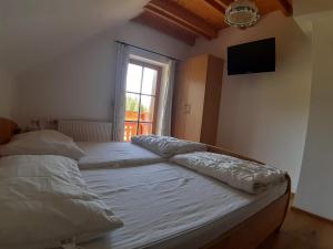 Posteľ alebo postele v izbe v ubytovaní Lachtalhütte