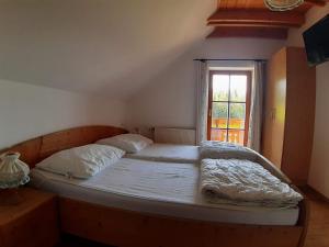 Posteľ alebo postele v izbe v ubytovaní Lachtalhütte