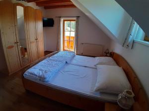 Posteľ alebo postele v izbe v ubytovaní Lachtalhütte