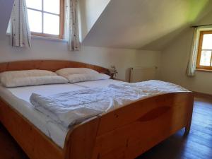 Posteľ alebo postele v izbe v ubytovaní Lachtalhütte