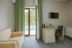 TV a/nebo společenská místnost v ubytování Sviana Resort