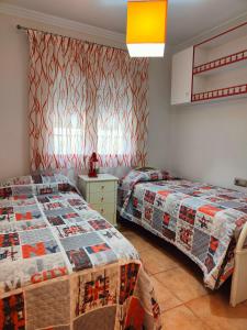 Postel nebo postele na pokoji v ubytování Apartamento zona playa de burriana con terraza