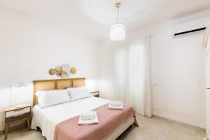 Posteľ alebo postele v izbe v ubytovaní Panarea 22