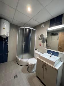 Vonios kambarys apgyvendinimo įstaigoje Park Diamond Apartments