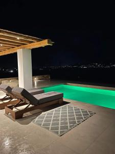 The swimming pool at or close to Voras Villa Panagia Beach