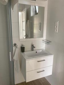 Fotografia z galérie ubytovania Rizling Apartmanház**** Balatonalmádi v destinácii Balatonalmádi