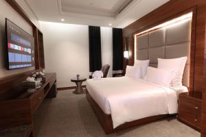 Letto o letti in una camera di Weekend Hotel Sari