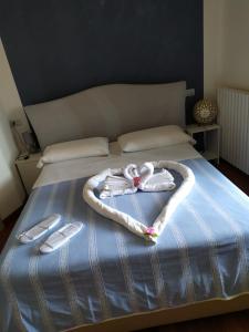 Postel nebo postele na pokoji v ubytování B&B Tiffany