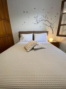 A bed or beds in a room at On the road house