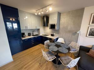 Kuchyňa alebo kuchynka v ubytovaní Apartament Przystań Polanki