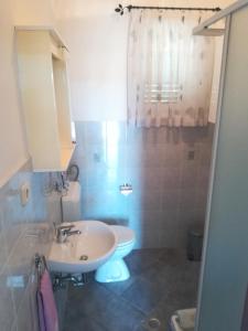 Kúpeľňa v ubytovaní Apartman Michael + 24 fotografií
