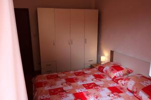 Posteľ alebo postele v izbe v ubytovaní Apartman Michael