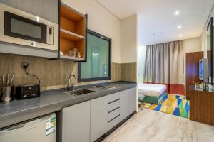 A cozinha ou cozinha compacta de Sama Al Qasr Hotel Apartments
