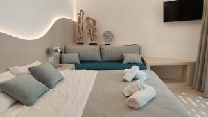 A bed or beds in a room at Armonia