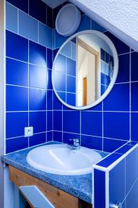 Kúpeľňa v ubytovaní Le Petit Fort - Duplex avec Piscine