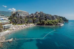 an aerial view of a beach with hotels and condos at Dukley Hotel & Resort in Budva