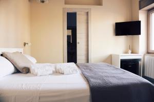 Postel nebo postele na pokoji v ubytování B&B NACALUI Gallipoli