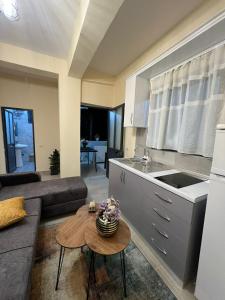 Kjøkken eller kjøkkenkrok på Dragoti Apartment 2