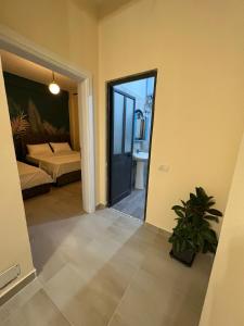 En eller flere senger på et rom på Dragoti Apartment 2