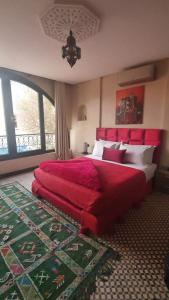 Postel nebo postele na pokoji v ubytování Auberge RIAD DLIM Tamraght